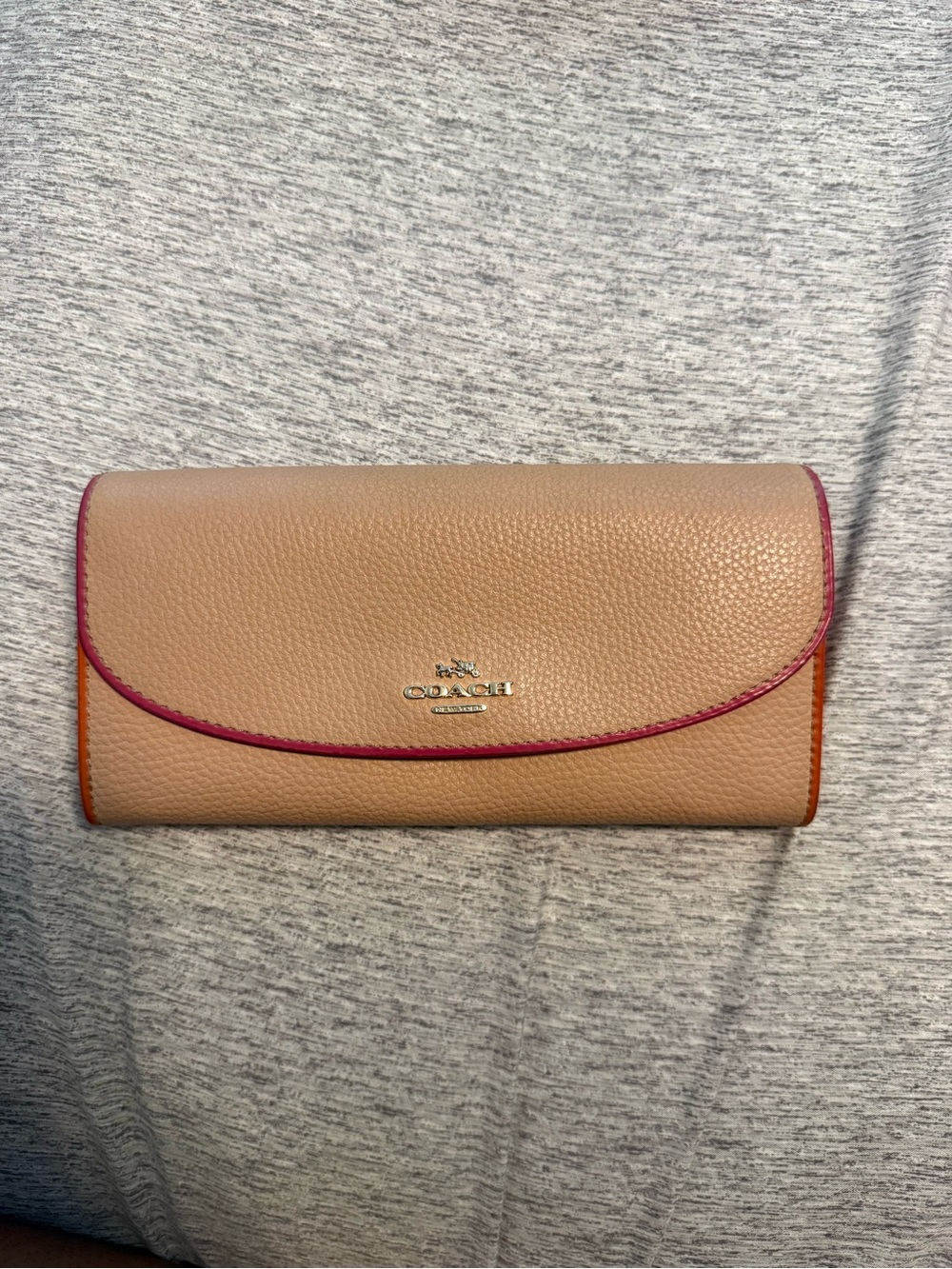 COACH Beige Pebbled Leather Clutch with Pink Trim and Orange Sides